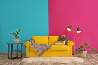 Interior of modern living room with pillows on sofa