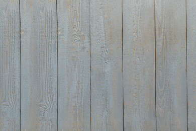 Texture of grey wooden board on black background, top view