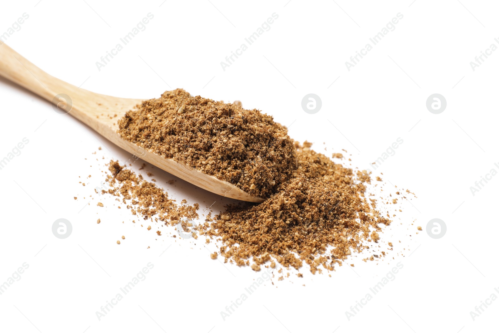 Photo of Wooden spoon of aromatic caraway (Persian cumin) powder isolated on white