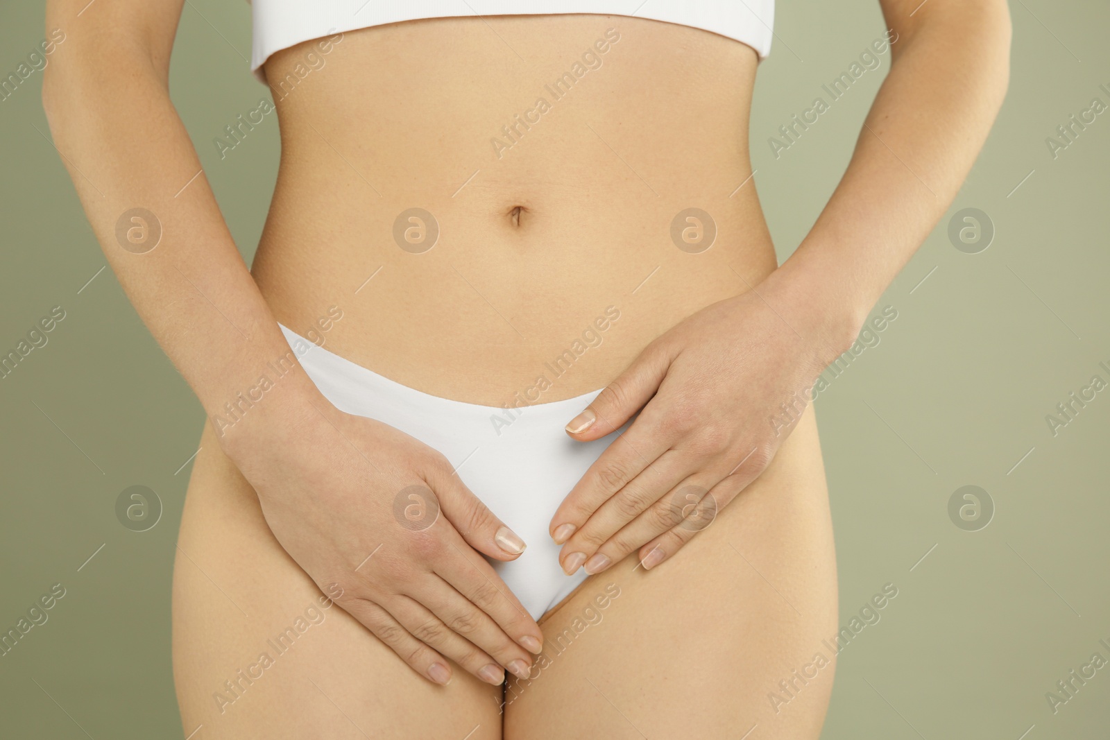 Photo of Gynecology. Woman in underwear on grey background, closeup