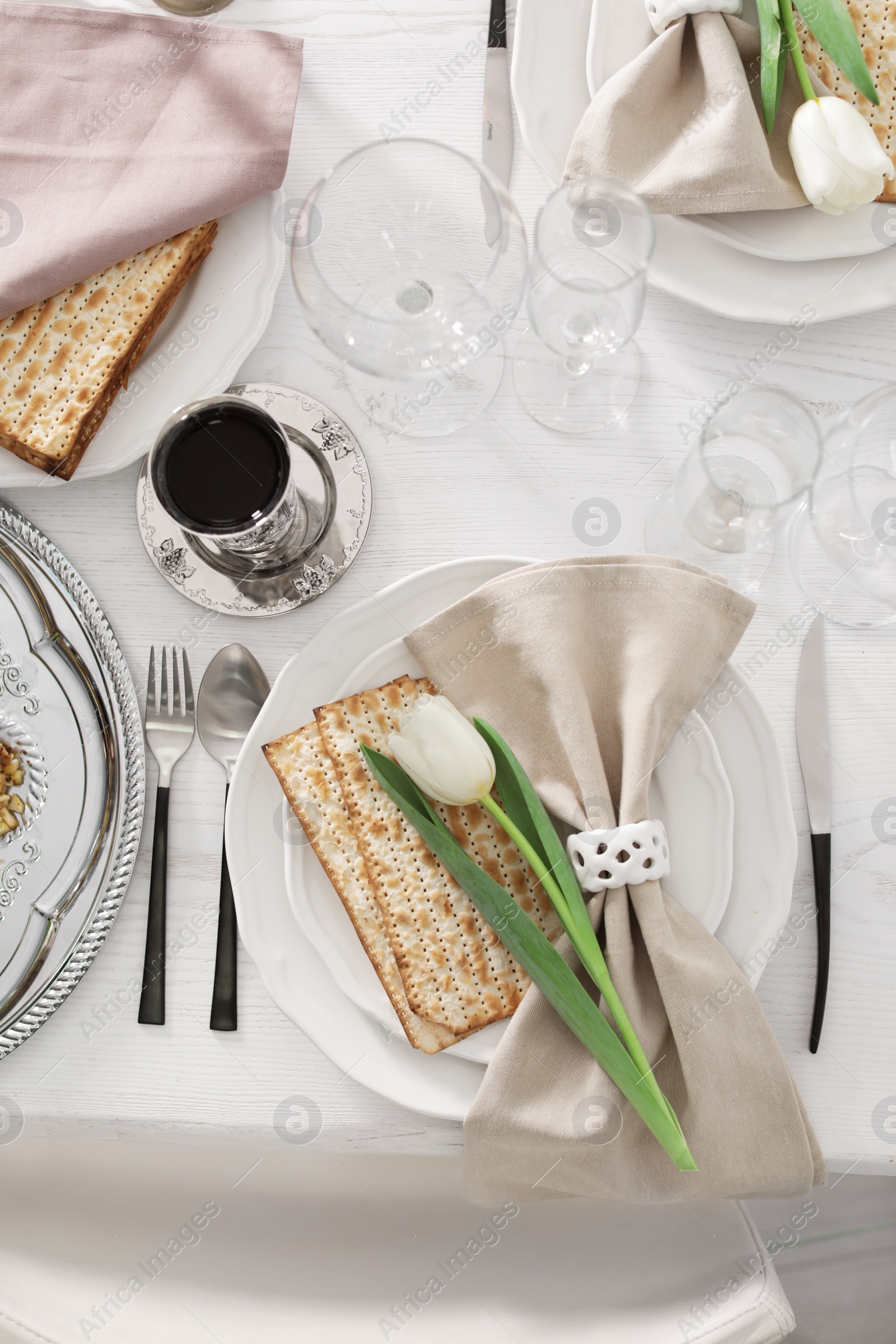 Photo of Festive Passover table setting, top view. Pesach celebration