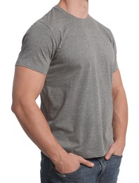 Man wearing grey t-shirt on white background, closeup. Mockup for design