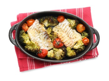 Photo of Tasty cod cooked with vegetables in baking tray isolated on white, top view