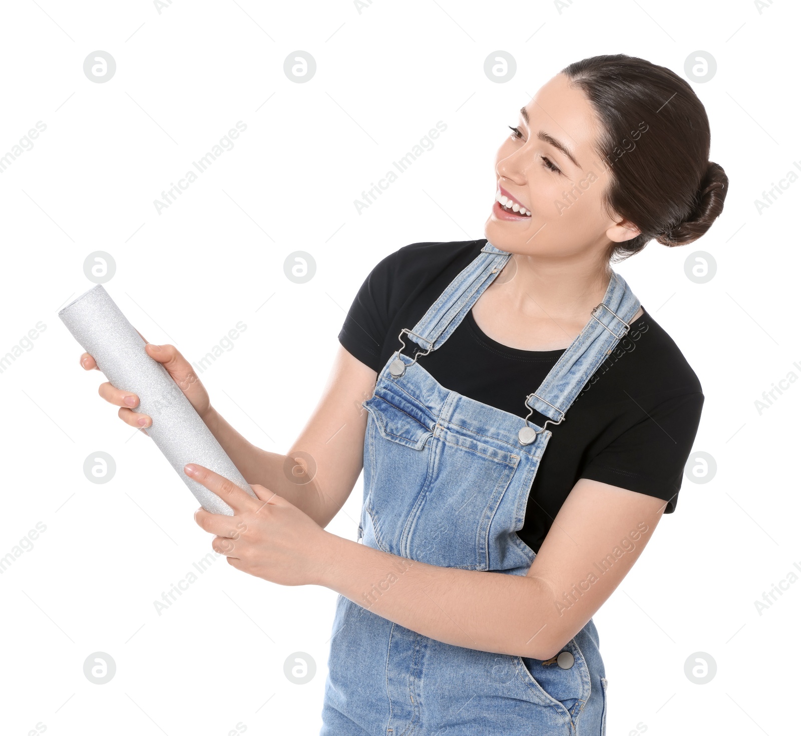 Photo of Young woman blowing up party popper isolated on white