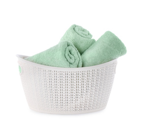 Fresh rolled towels in plastic bowl isolated on white