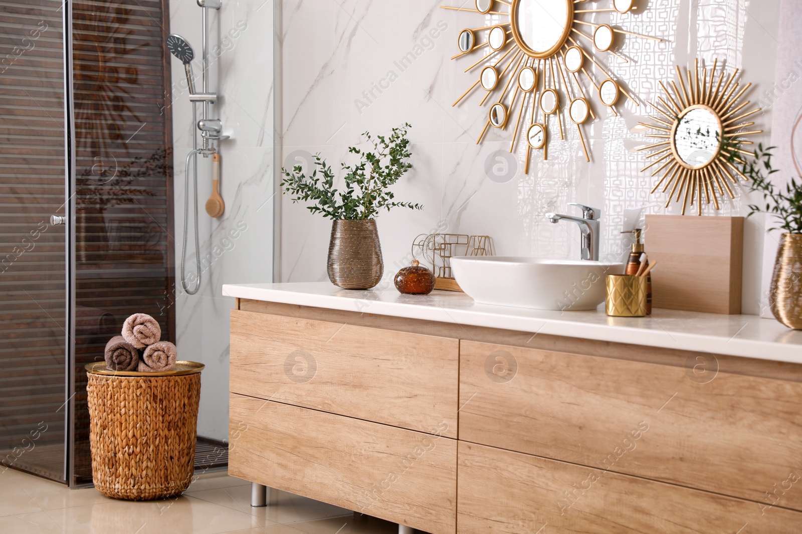 Photo of Modern bathroom interior with stylish mirror and vessel sink