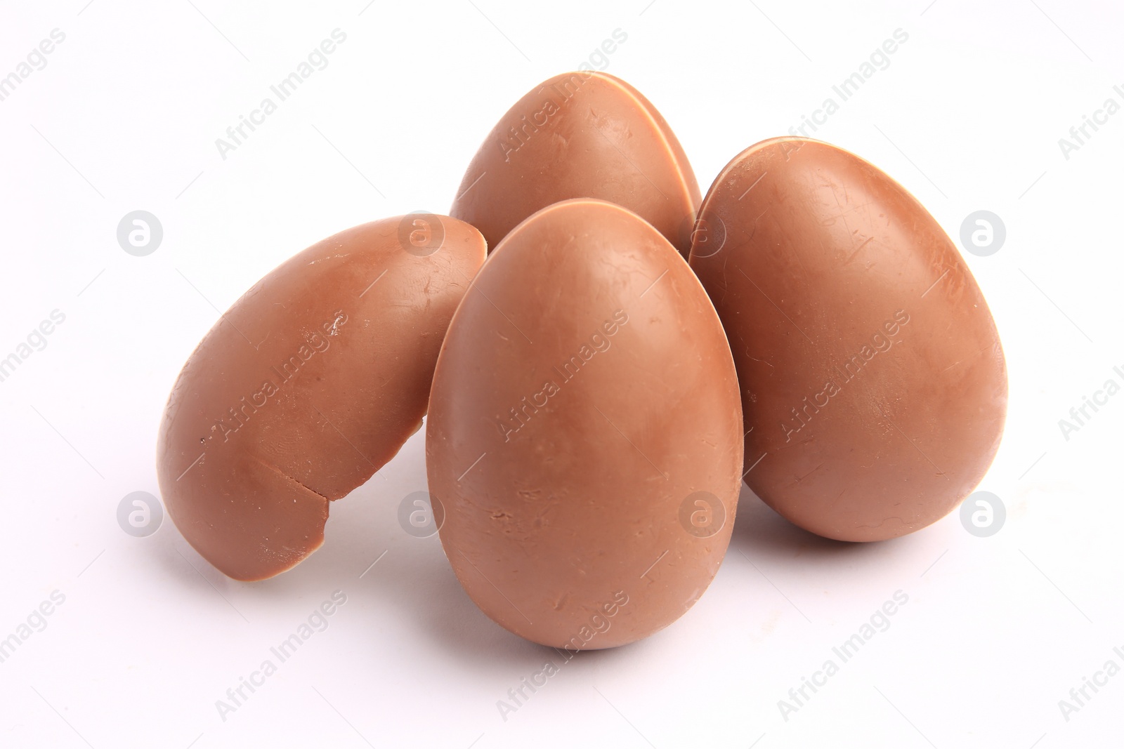 Photo of Sveti Vlas, Bulgaria - June 27, 2023: Unwrapped Kinder Surprise Eggs isolated on white