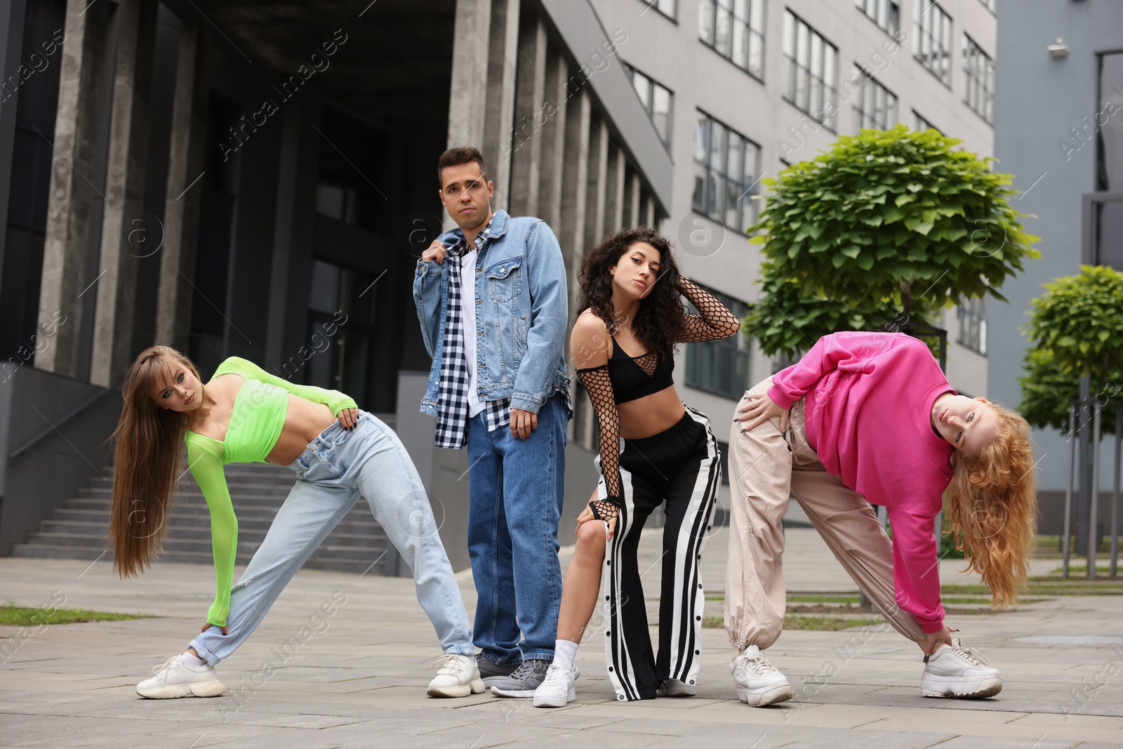 Photo of Group of people dancing hip hop outdoors