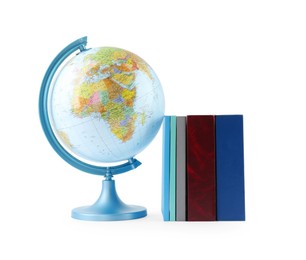 Photo of Plastic model globe of Earth and books on white background. Geography lesson