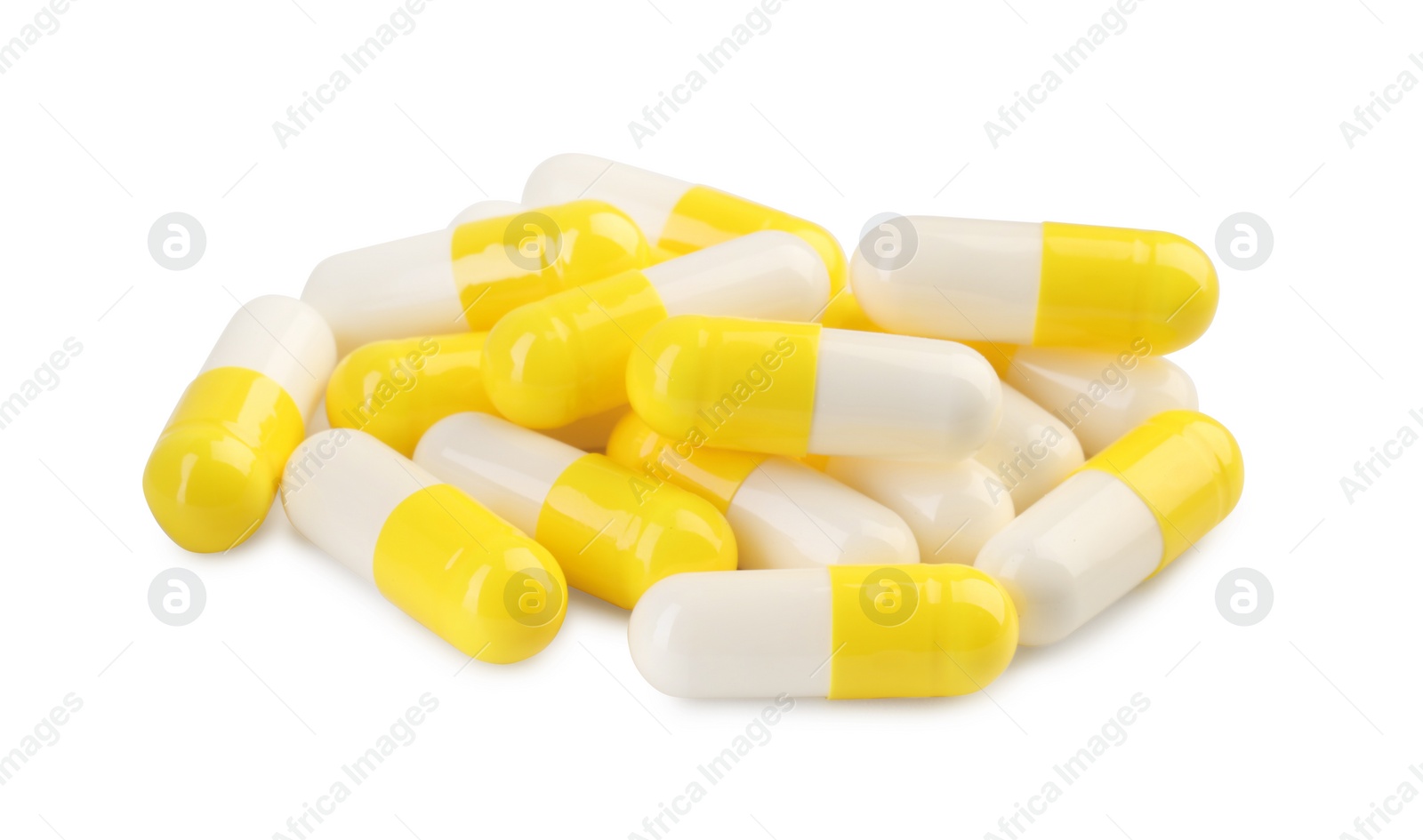 Photo of Many antibiotic pills isolated on white. Medicinal treatment