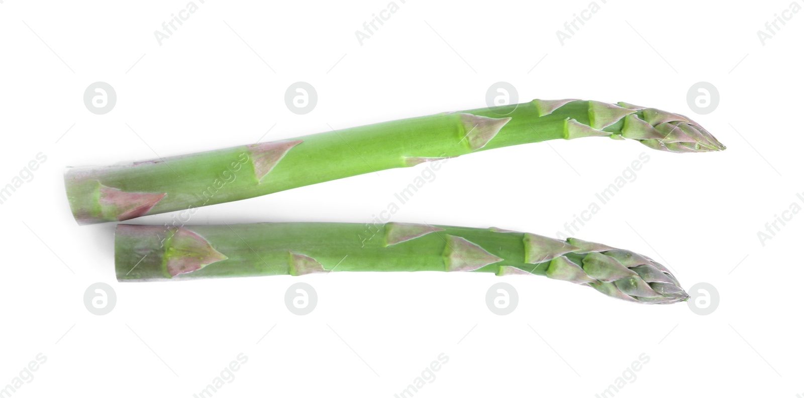 Photo of Fresh raw asparagus isolated on white, top view. Healthy eating