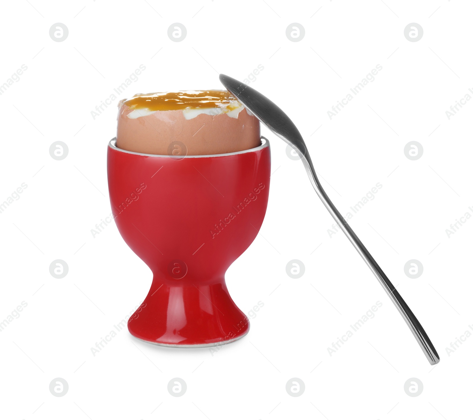 Photo of Cup with fresh soft boiled egg and spoon on white background