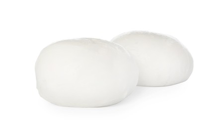 Delicious mozzarella cheese balls on white background