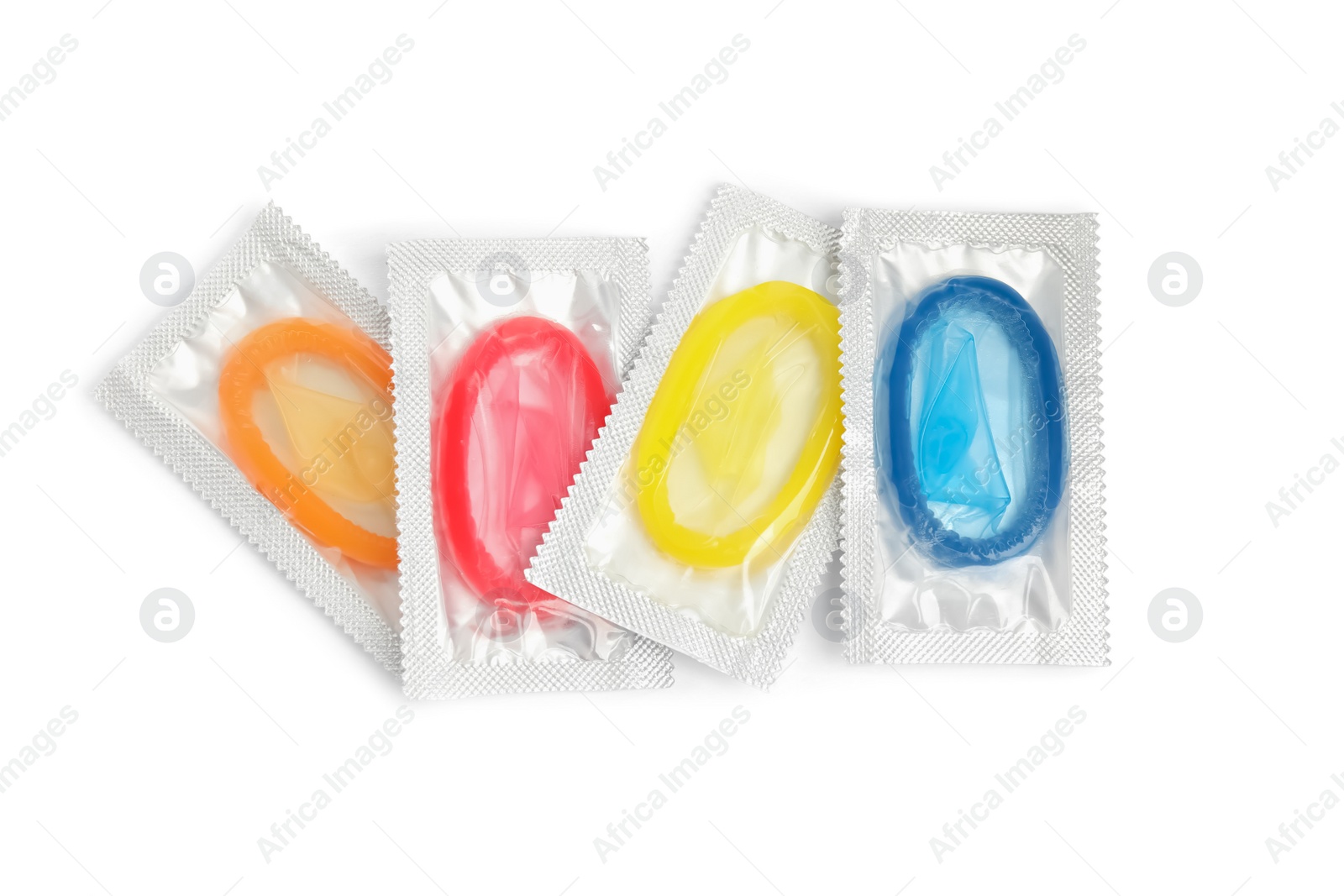 Photo of Condom packages on white background, top view. Safe sex