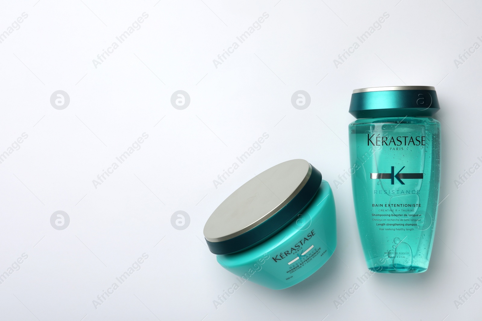 Photo of MYKOLAIV, UKRAINE - SEPTEMBER 07, 2021: Kerastase hair care cosmetic products on light background, flat lay. Space for text
