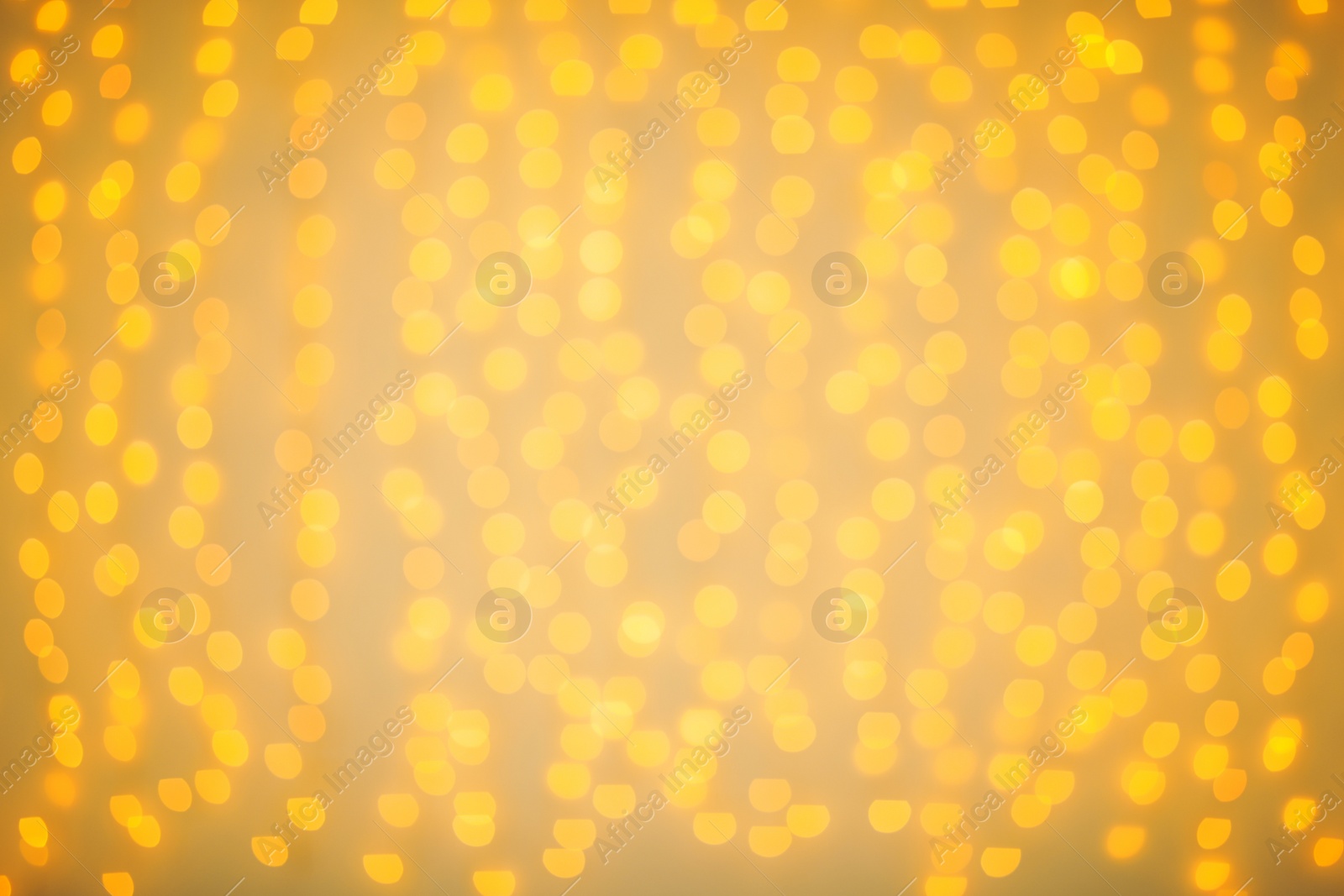 Photo of Beautiful gold lights as background. Bokeh effect