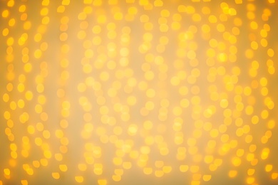 Photo of Beautiful gold lights as background. Bokeh effect