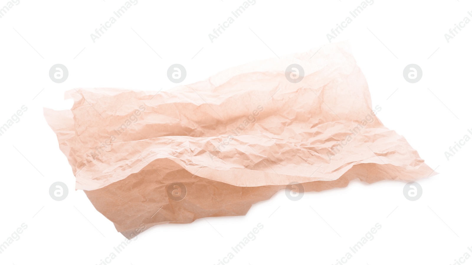 Photo of Sheets of crumpled baking paper isolated on white