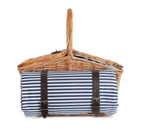 Photo of Closed wicker picnic basket with blanket on white background