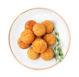 Plate with delicious fried tofu balls and pea sprouts on white background, top view