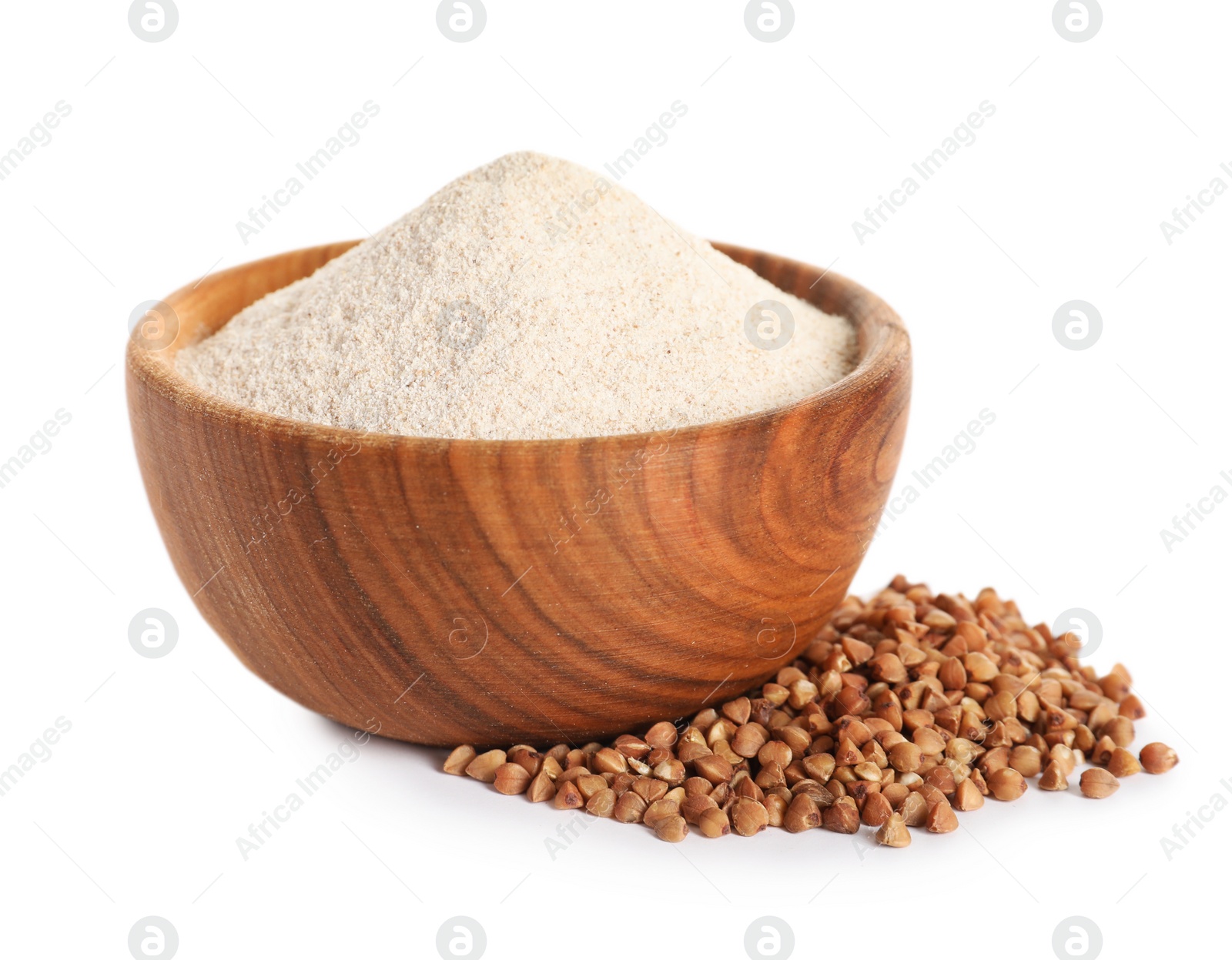 Image of Buckwheat flour in wooden bowl and seeds on white background