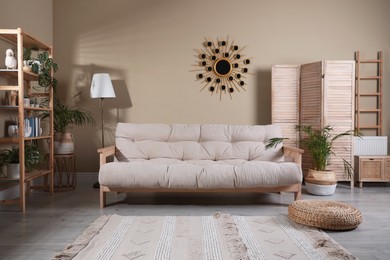 Photo of Stylish living room interior with comfortable sofa