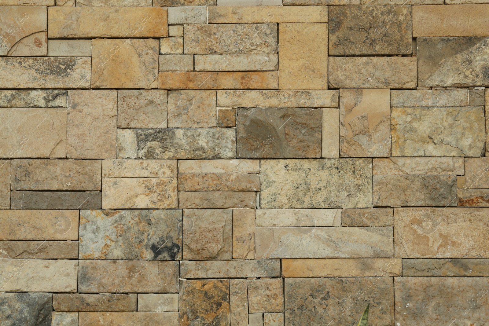 Photo of Texture of beautiful stone wall as background