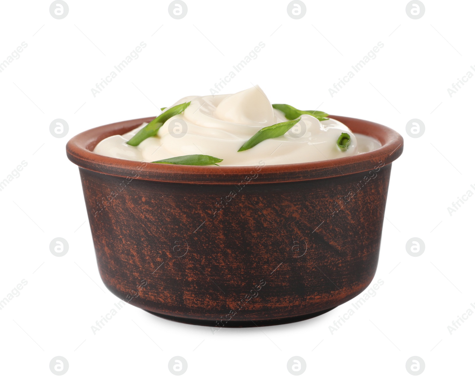 Photo of Mayonnaise with green onion in bowl isolated on white