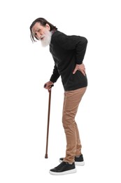 Photo of Senior man with walking cane suffering from back pain on white background