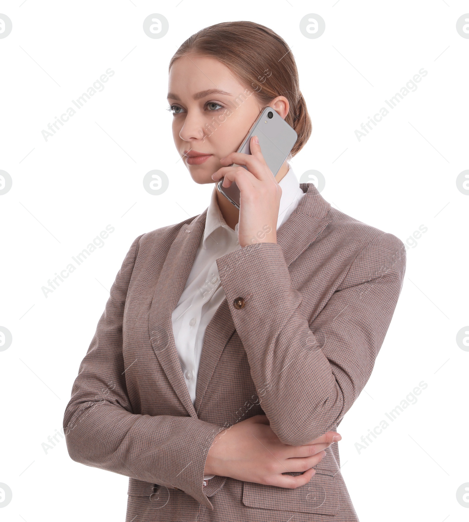 Photo of Young businesswoman talking on mobile phone against white background