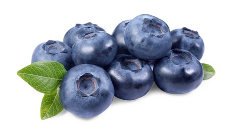 Photo of Pile of fresh ripe blueberries and leaves isolated on white