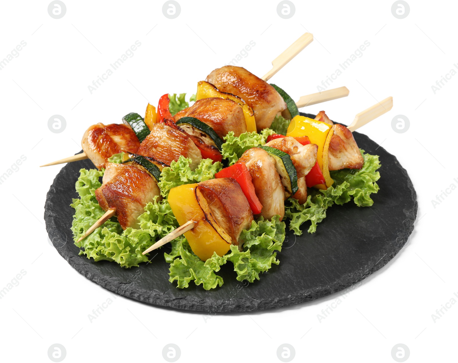 Photo of Delicious chicken shish kebabs with vegetables on white background