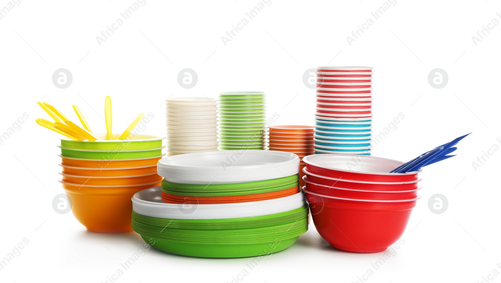 Photo of Plastic dishware isolated on white. Picnic table setting