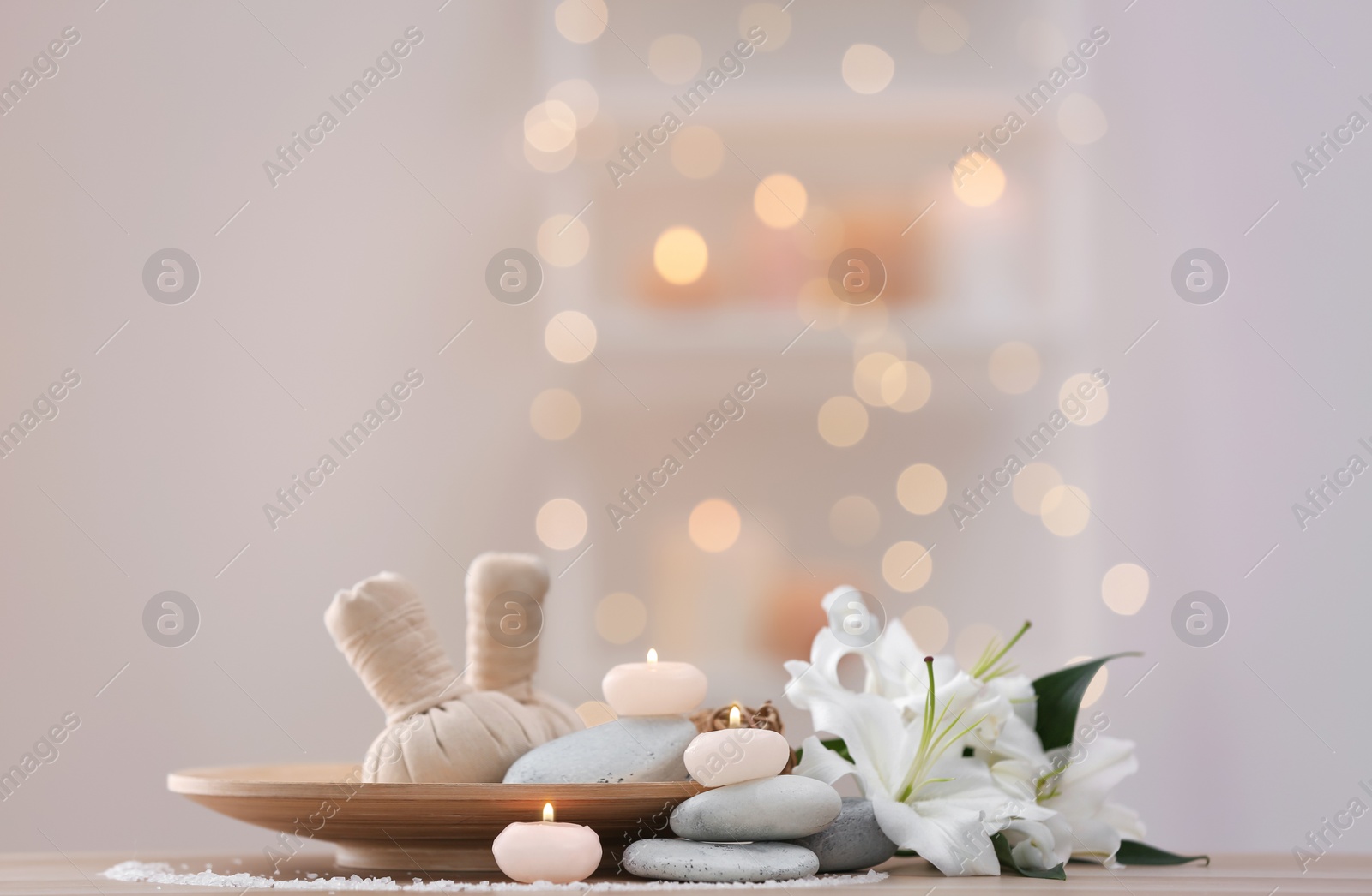 Photo of Beautiful spa composition on table in wellness center