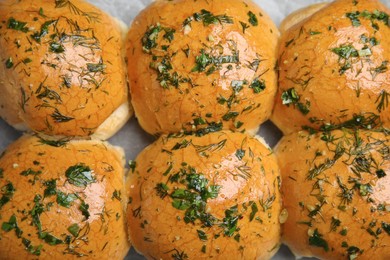 Photo of Traditional pampushka buns with garlic and herbs, closeup