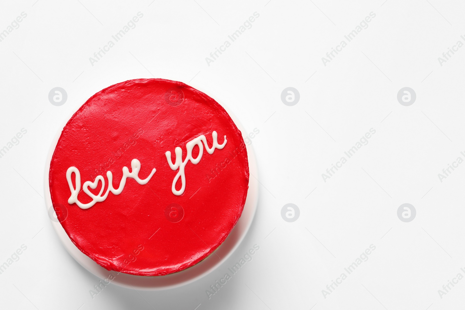 Photo of Bento cake with text Love You and space for text on white table, top view. St. Valentine's day surprise