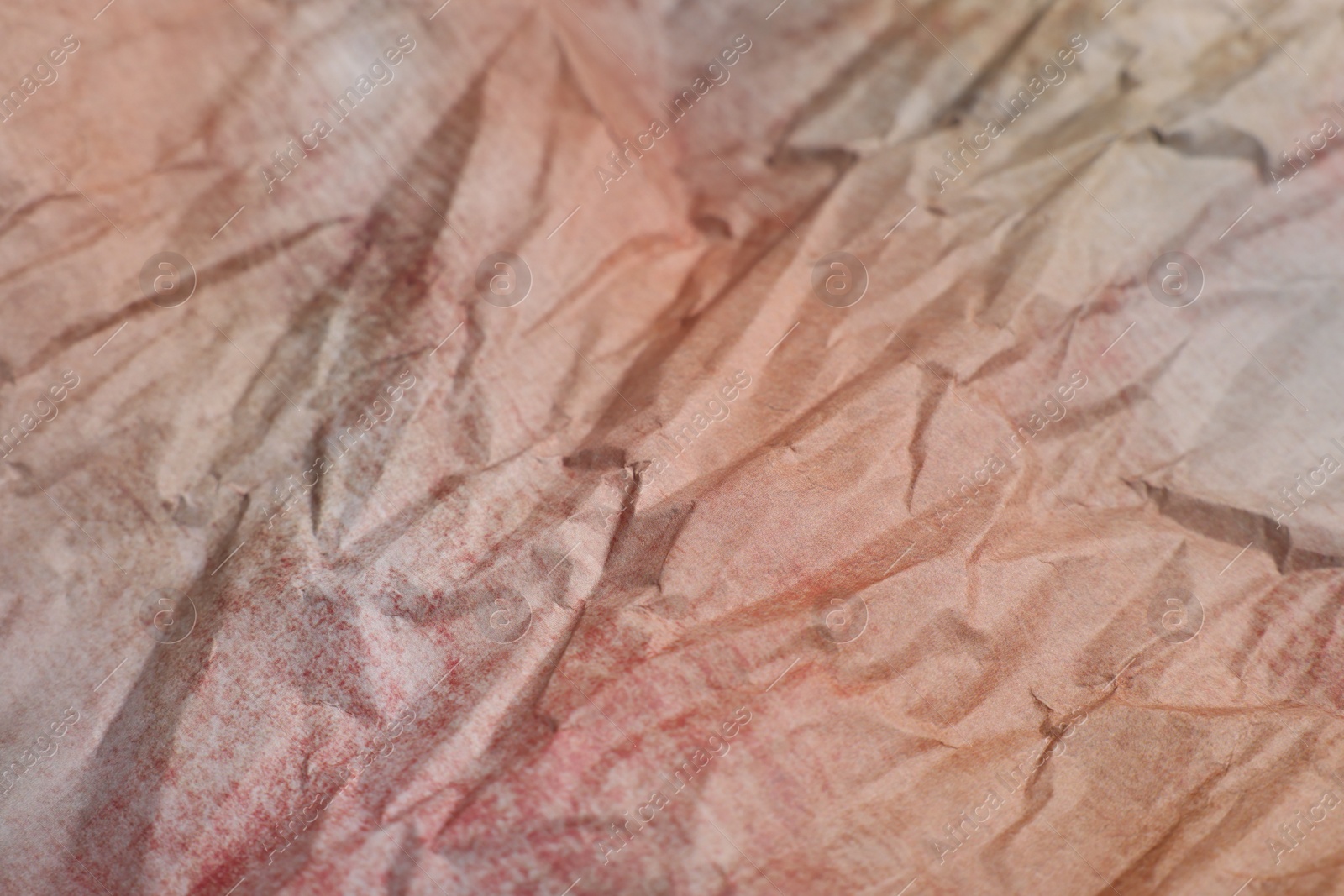 Photo of Texture of crumpled parchment paper as background, closeup