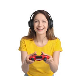 Photo of Happy woman in headphones playing video game with controller on white background