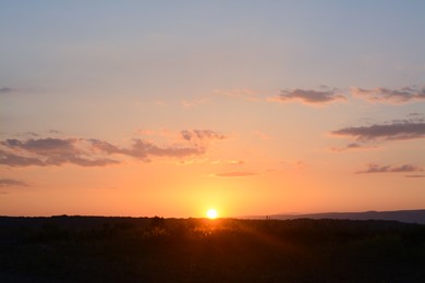 Picturesque view of beautiful field at sunset