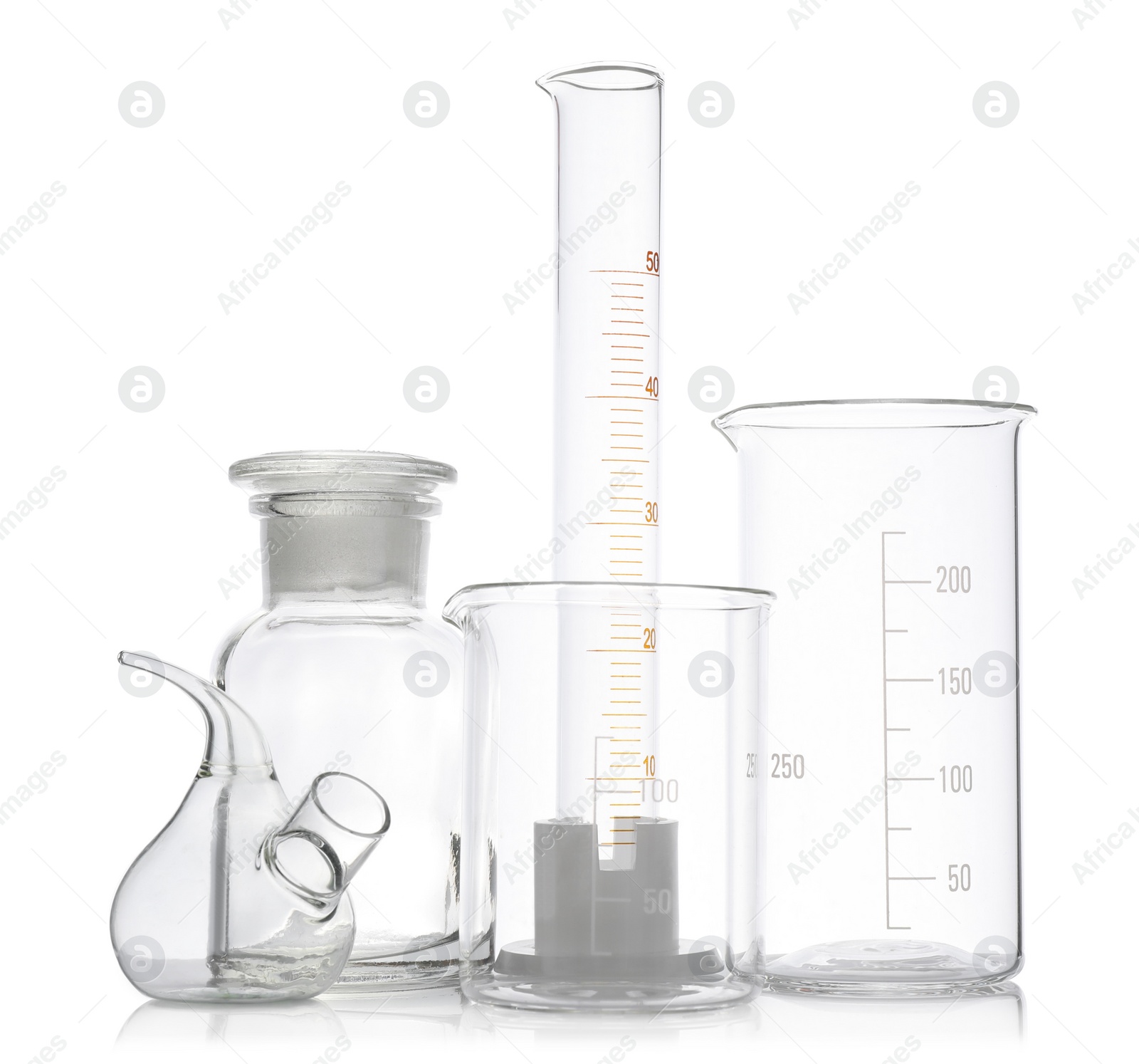 Photo of Clean empty laboratory glassware on white background