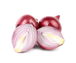 Fresh whole and cut red onions on white background