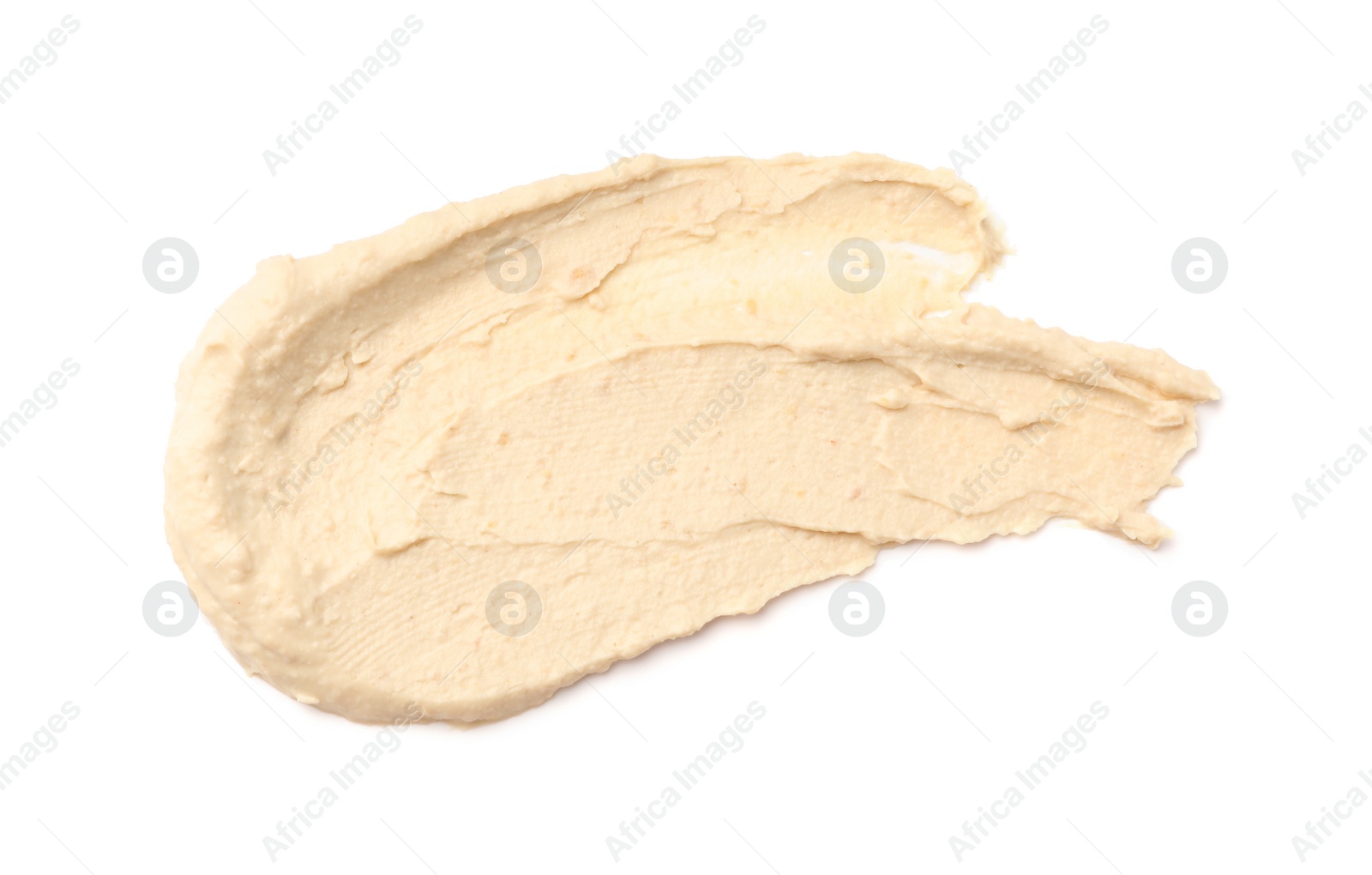 Photo of Smear of tasty hummus isolated on white, top view