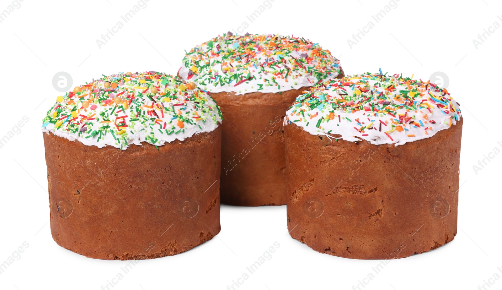 Photo of Traditional Easter cakes with sprinkles isolated on white