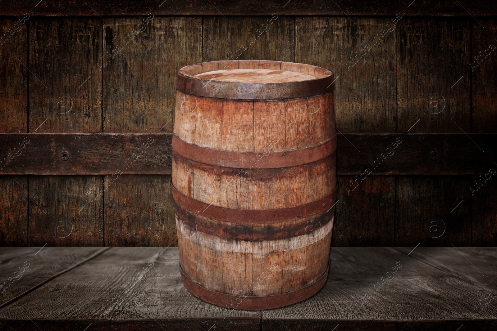 Image of One wooden barrel on shelf near textured wall