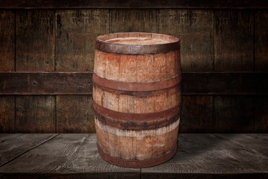 Image of One wooden barrel on shelf near textured wall