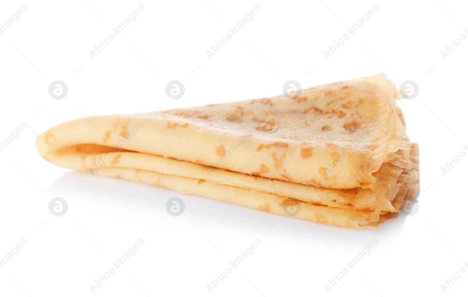 Photo of Tasty thin folded pancake on white background