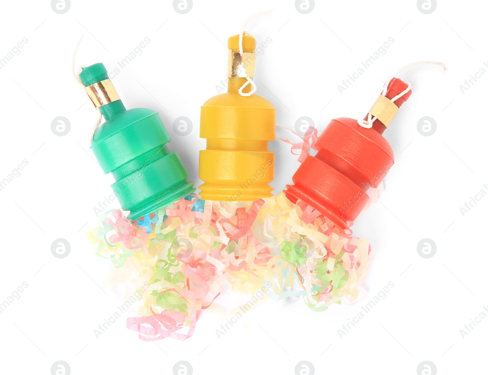 Photo of Colorful streamers with bright party crackers isolated on white, top view