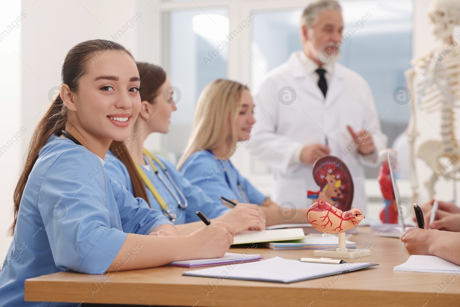 Photo of Portrait of young intern wearing uniform on lecture in university