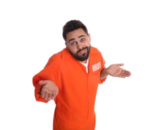 Photo of Prisoner in special jumpsuit perplexedly shrugging his shoulders on white background