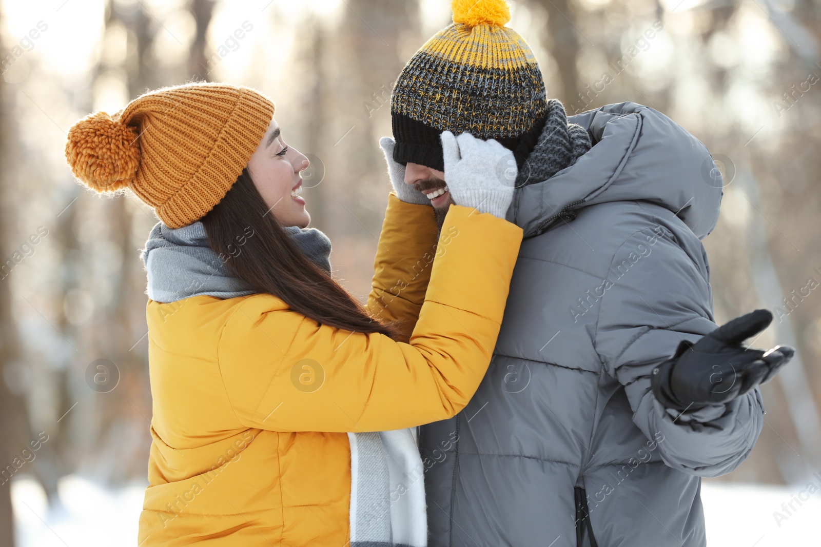 Photo of Happy young couple having fun outdoors on winter day